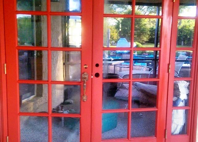 Double Doors After Being Painted Red by Alaska Painting Company